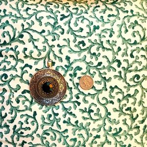 Black and silver pendant